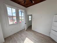 unfurnished bedroom featuring wood ceiling