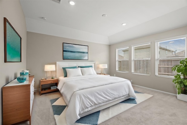 bedroom featuring recessed lighting, baseboards, and light colored carpet