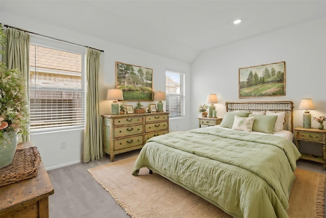 bedroom with recessed lighting, vaulted ceiling, and baseboards