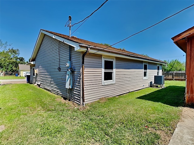 view of home's exterior featuring a lawn