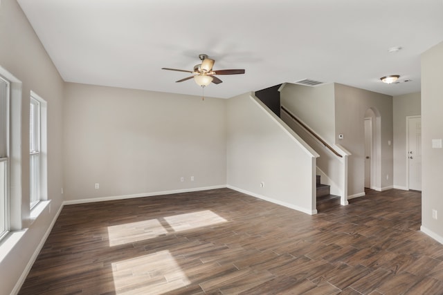 unfurnished living room with wood-type flooring and ceiling fan