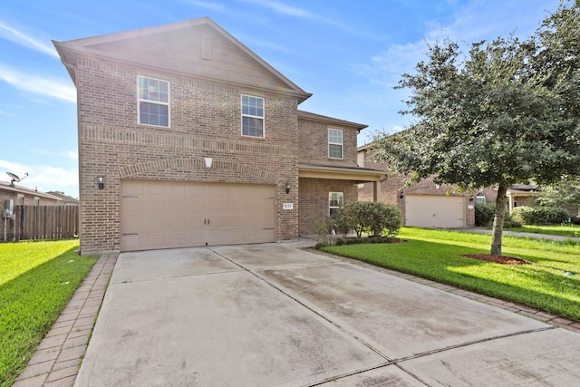 front facade with a garage and a front lawn