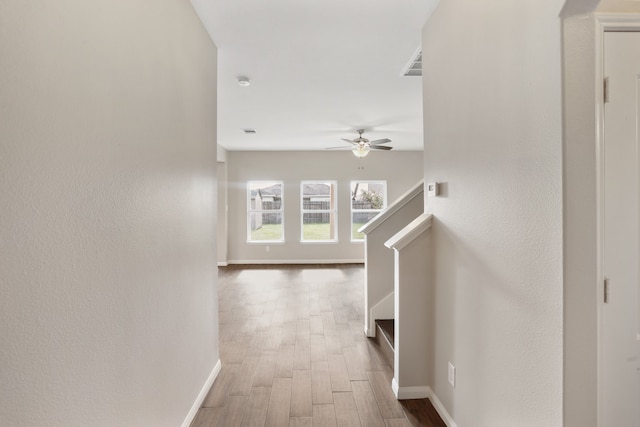 hallway featuring hardwood / wood-style flooring