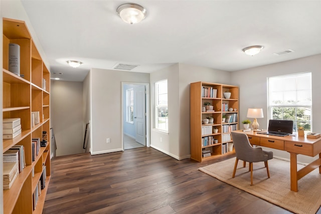 office space with dark hardwood / wood-style flooring