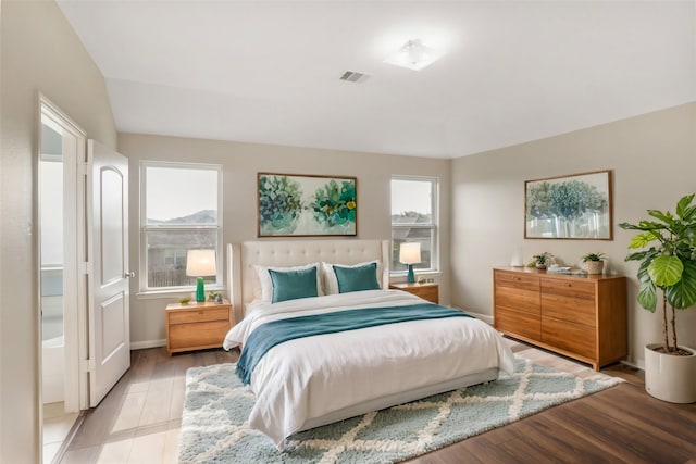 bedroom featuring light wood-type flooring