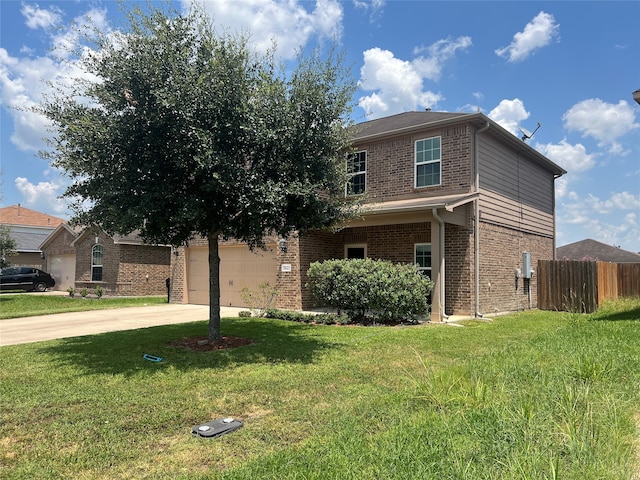 view of front facade with a garage and a front lawn