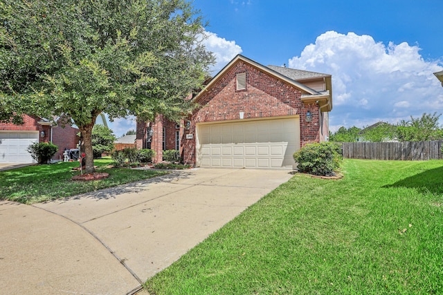 front of property featuring a garage and a front lawn