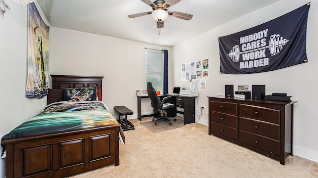 carpeted bedroom with ceiling fan