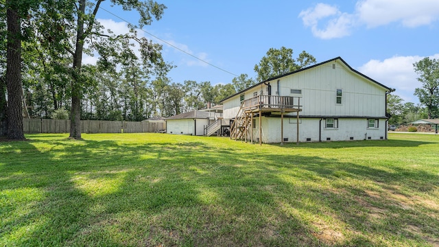 view of yard featuring a wooden deck