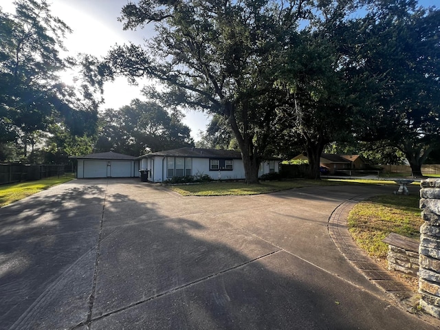 ranch-style house featuring a garage