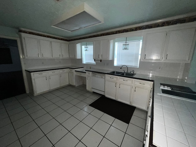 kitchen with white dishwasher, sink, light tile patterned floors, decorative backsplash, and white cabinetry