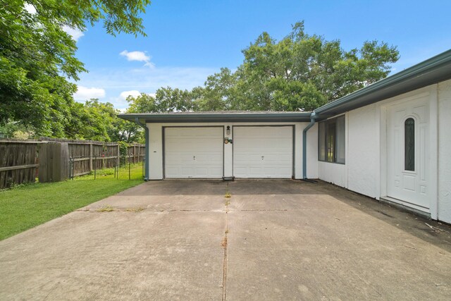 1826 E Ave, Katy, TX 77493 - garage featuring concrete driveway