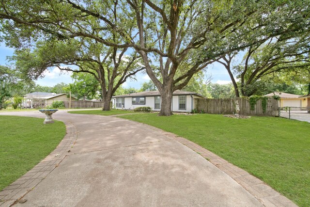1826 E Ave, Katy, TX 77493 - ranch-style home featuring driveway