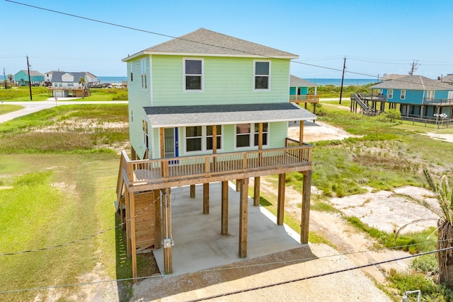 view of front facade featuring a carport and covered porch