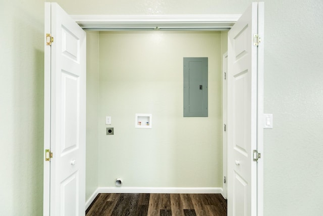 laundry room with hookup for a washing machine, electric dryer hookup, dark hardwood / wood-style floors, and electric panel