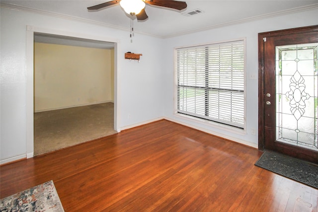 foyer entrance featuring crown molding, ceiling fan, and hardwood / wood-style floors