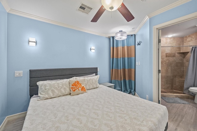 bedroom featuring crown molding, ceiling fan, and hardwood / wood-style floors