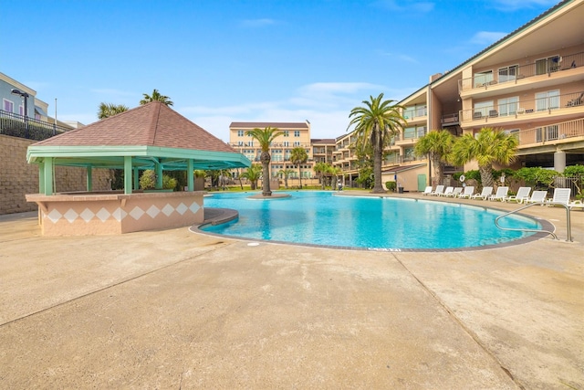 view of pool featuring a gazebo and a patio area