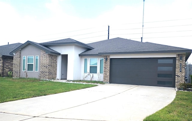 view of front of property with brick siding, a shingled roof, an attached garage, a front yard, and driveway