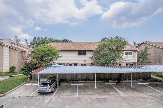 view of car parking featuring a carport