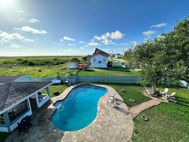 view of swimming pool with a patio area, a fenced backyard, and a fenced in pool