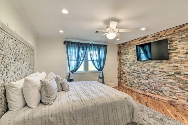 bedroom with ceiling fan, baseboards, wood finished floors, and recessed lighting