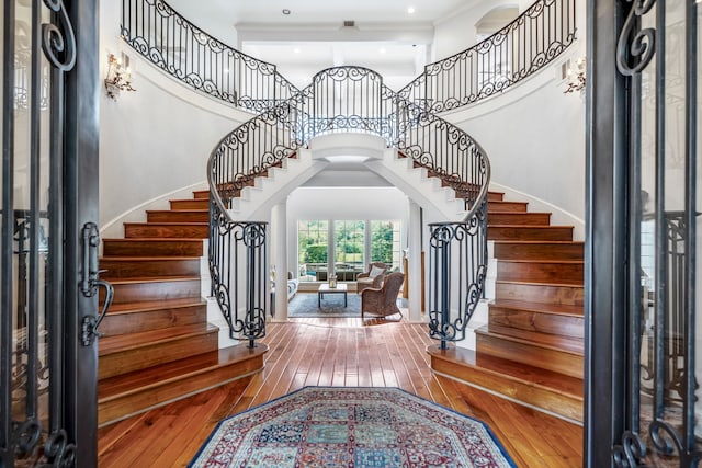 foyer entrance with hardwood / wood-style floors