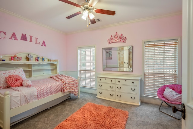 bedroom featuring carpet floors, ornamental molding, and ceiling fan