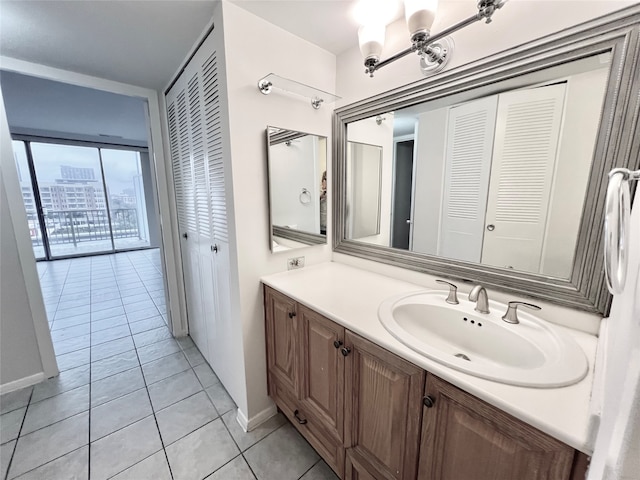 bathroom featuring vanity and tile patterned flooring