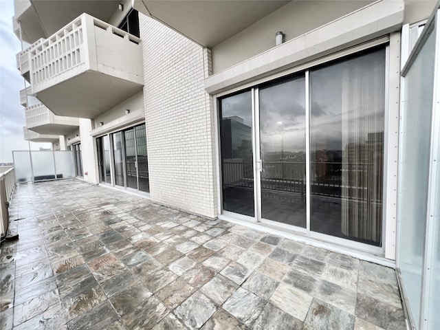 view of patio / terrace featuring a balcony