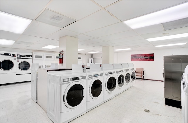 laundry room with washing machine and clothes dryer