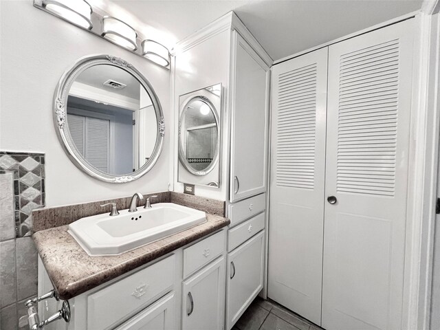 bathroom featuring vanity and tile patterned flooring