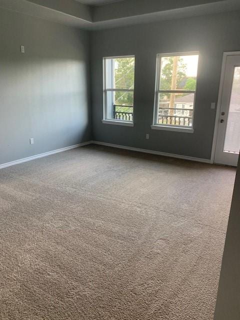 empty room featuring carpet floors