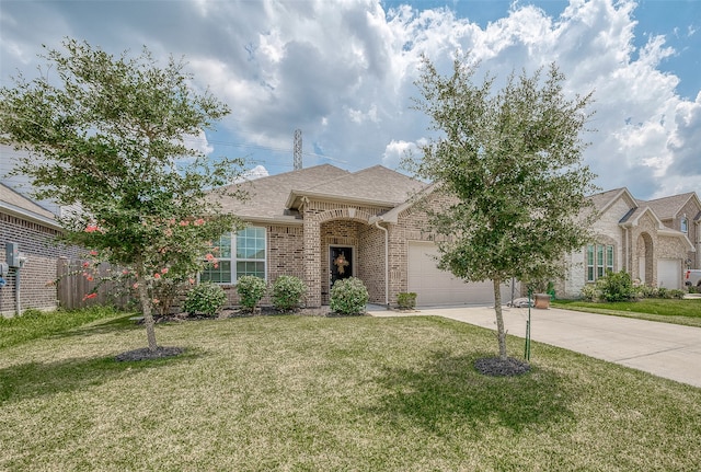 ranch-style home featuring a garage and a front yard