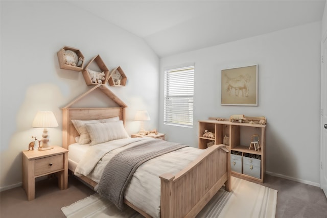 bedroom featuring dark carpet and lofted ceiling