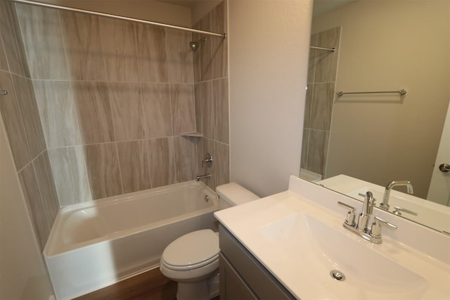 full bathroom featuring vanity, wood-type flooring, bathtub / shower combination, and toilet