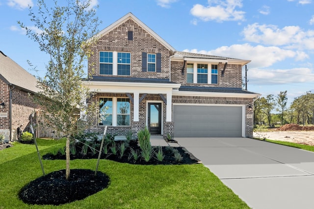 view of front facade featuring a garage and a front lawn