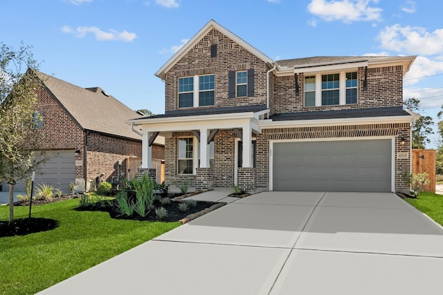 view of front facade with a front lawn and a garage