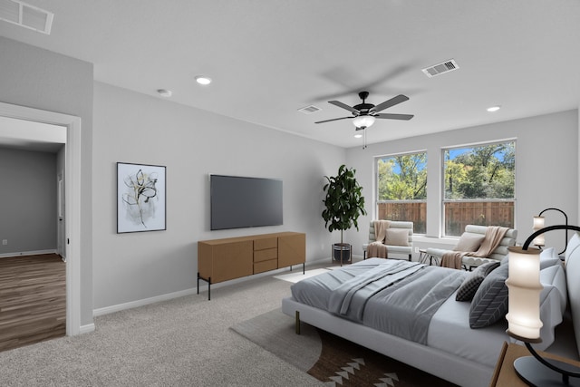 carpeted bedroom with ceiling fan