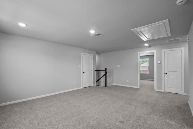 empty room featuring carpet flooring