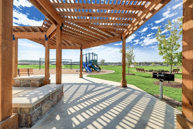 view of patio / terrace featuring a pergola and a playground