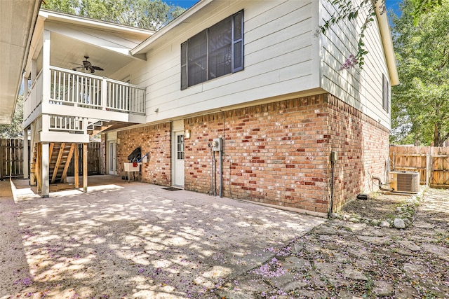 exterior space featuring ceiling fan, central air condition unit, and a patio