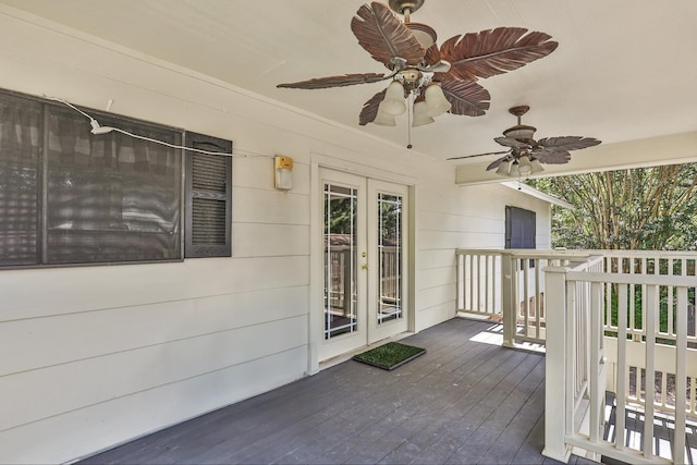 deck with ceiling fan and french doors