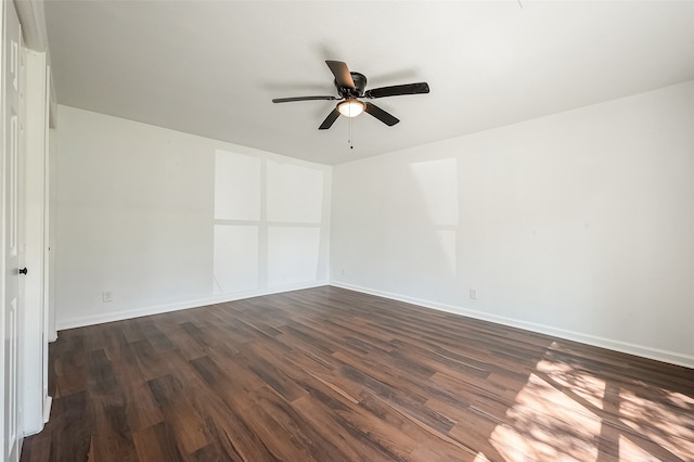 unfurnished room featuring ceiling fan and dark hardwood / wood-style flooring