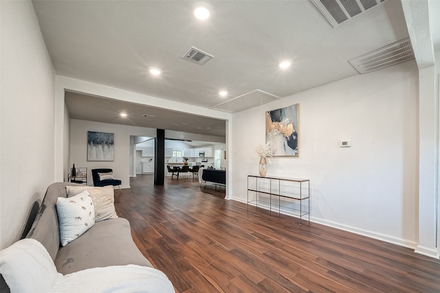 living room featuring dark hardwood / wood-style floors