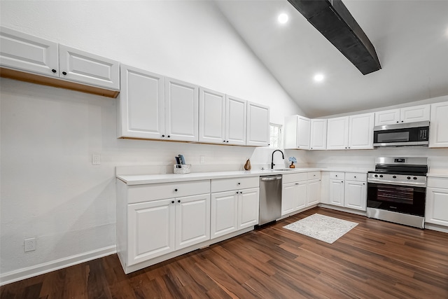 kitchen featuring dark hardwood / wood-style floors, sink, stainless steel appliances, and white cabinets