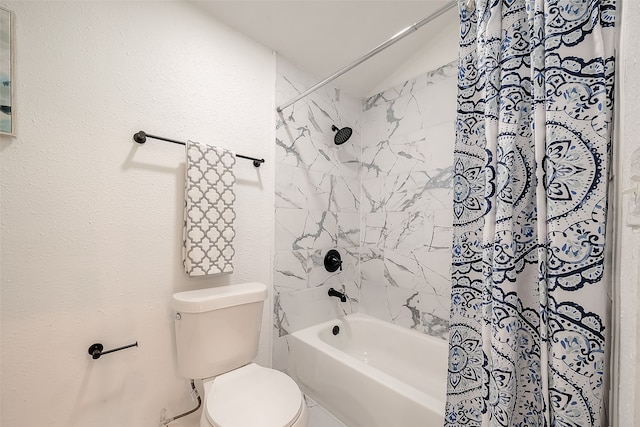 bathroom with lofted ceiling, shower / tub combo, and toilet