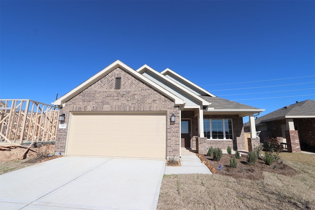 craftsman house with a garage