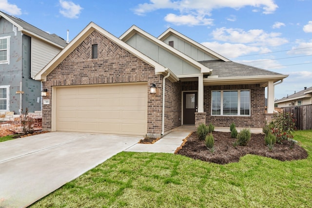 view of front of house featuring a garage, brick siding, driveway, board and batten siding, and a front yard