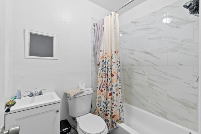 full bathroom featuring vanity, shower / tub combo with curtain, and toilet